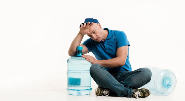 A man possibly exhausted from drinking too much water 