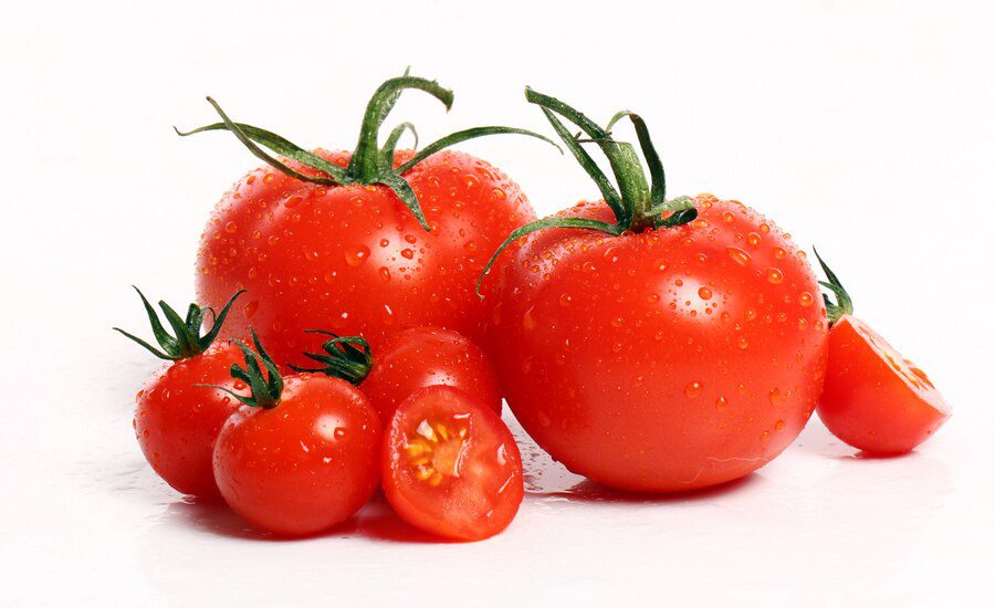 An image of tomatoes as a part of the group of healthy foods.