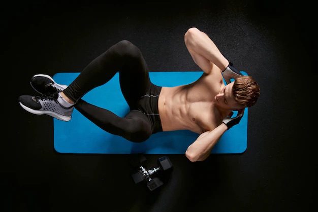 A man doing a push-up in fitness for men.
